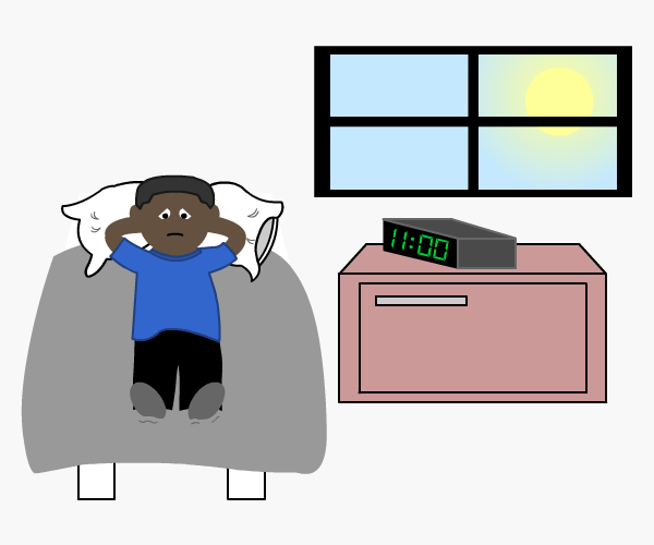 Depressed man lying in bed with the sun shining outside the window