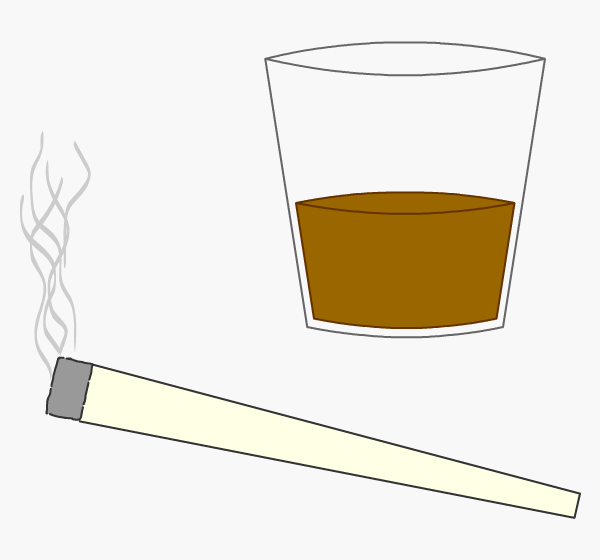 A shot glass with brown spirit and a cannabis joint