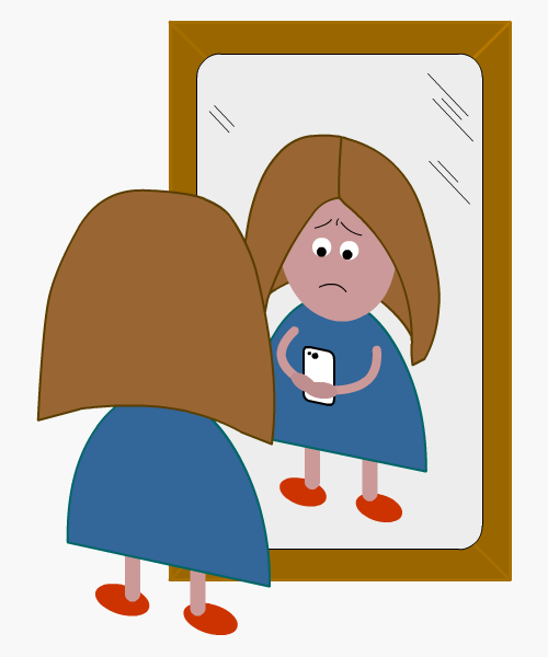 Stressed young woman at the mirror looking down at her phone