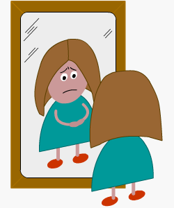 Anxious girl looking into a mirror